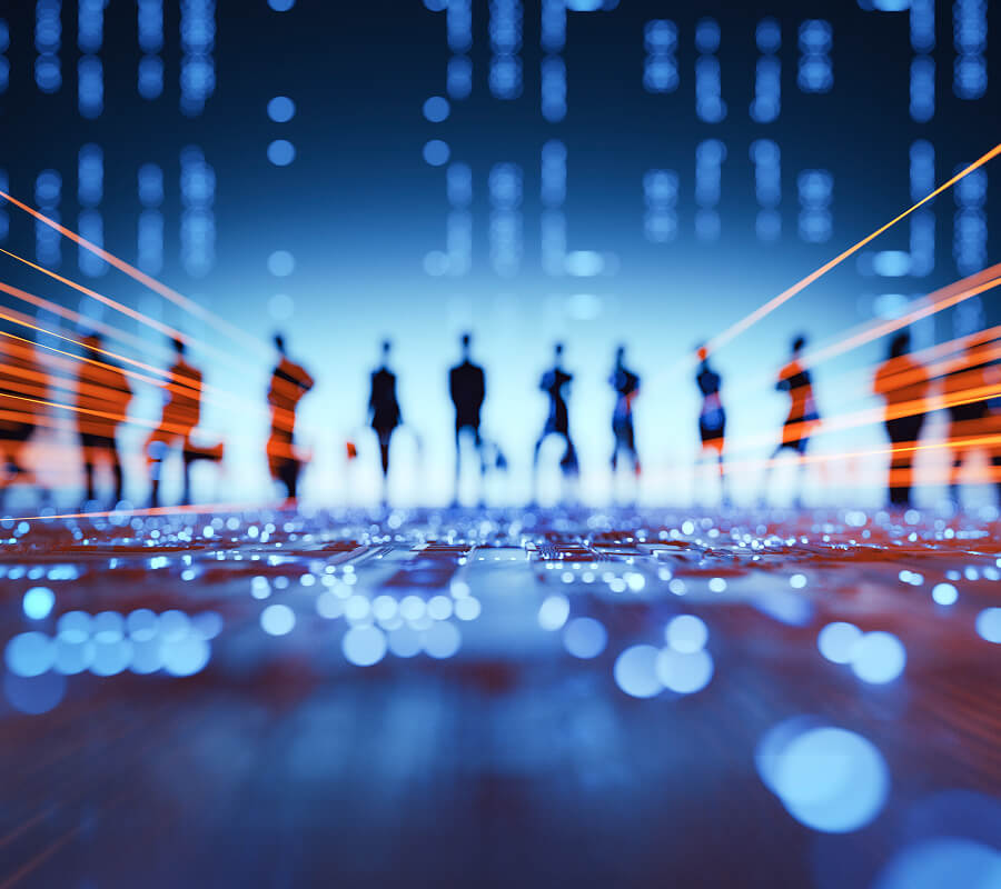 Abstract silhouettes of professionals with digital light effects, symbolizing the digital transformation process.