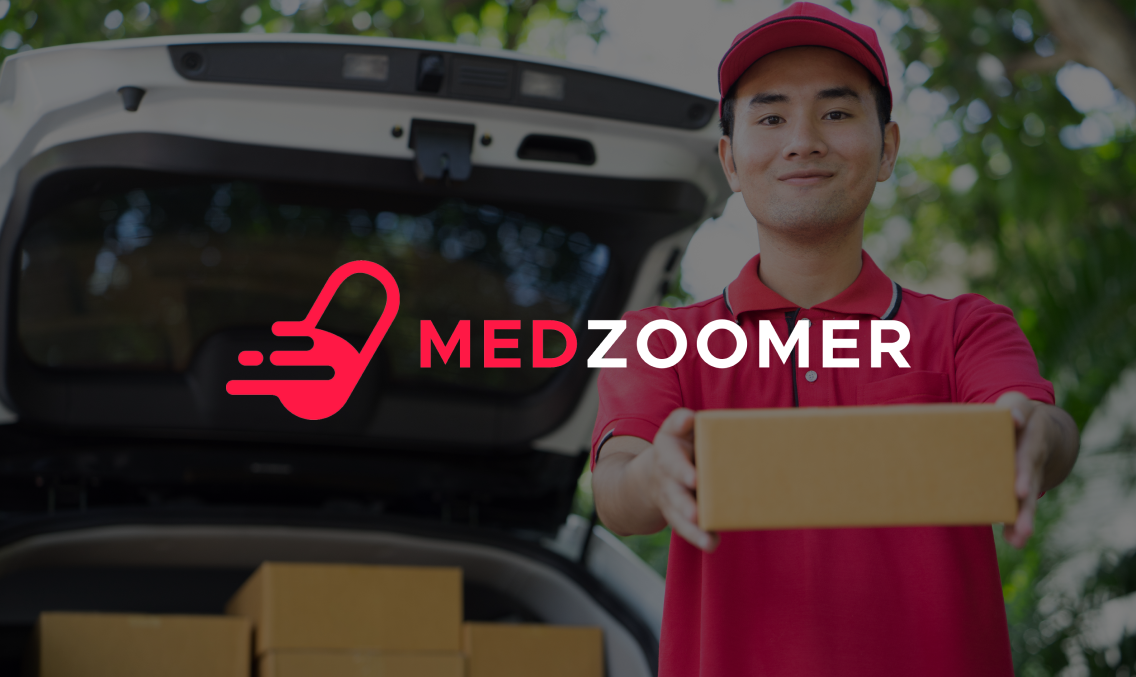 Asian delivery man dressed in red uniform delivering package